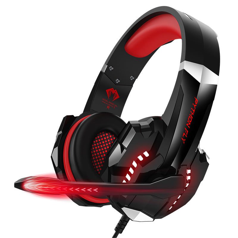 Red wired gaming headset with USB plug and attached microphone on a white background