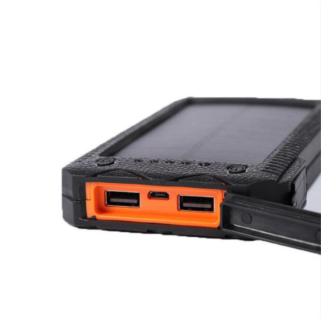 Batterie Externe Solaire Rugged — Torche LED, Briquet, Étanche & Anti-Choc